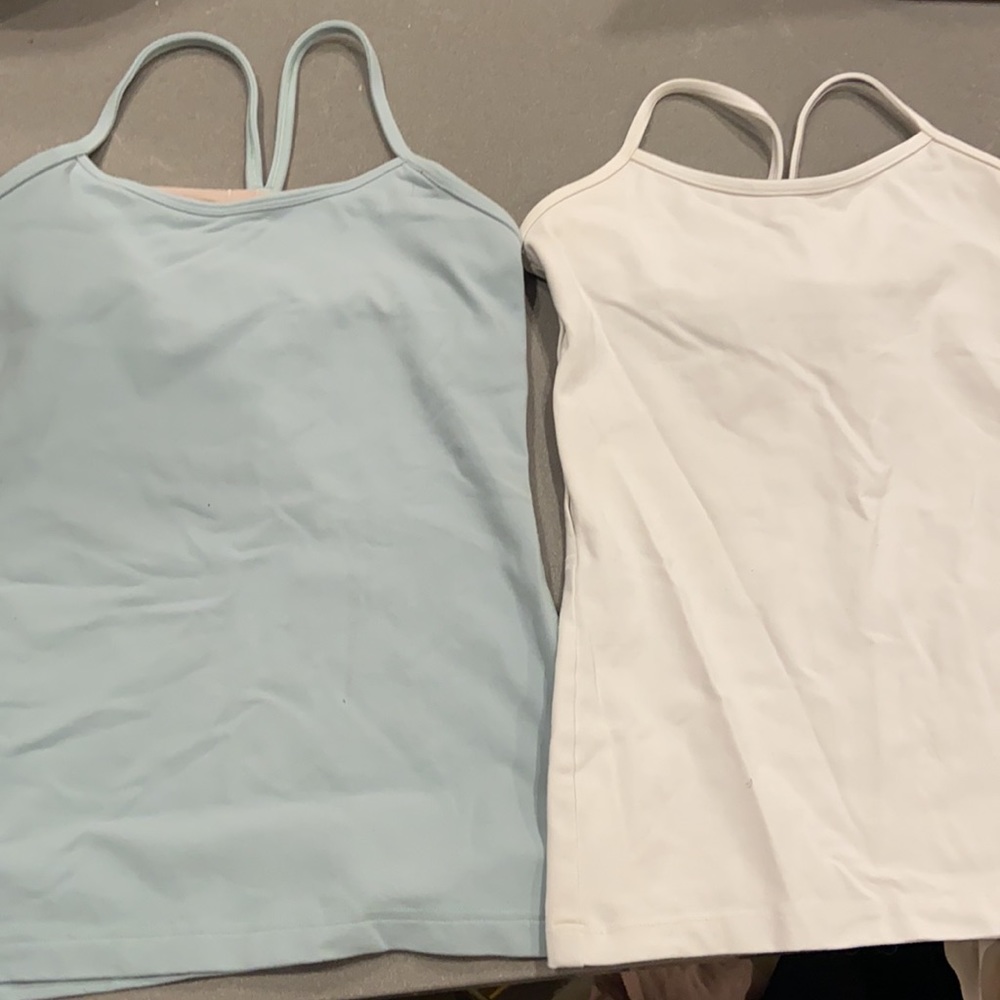 Two small Lululemon workout tanks
